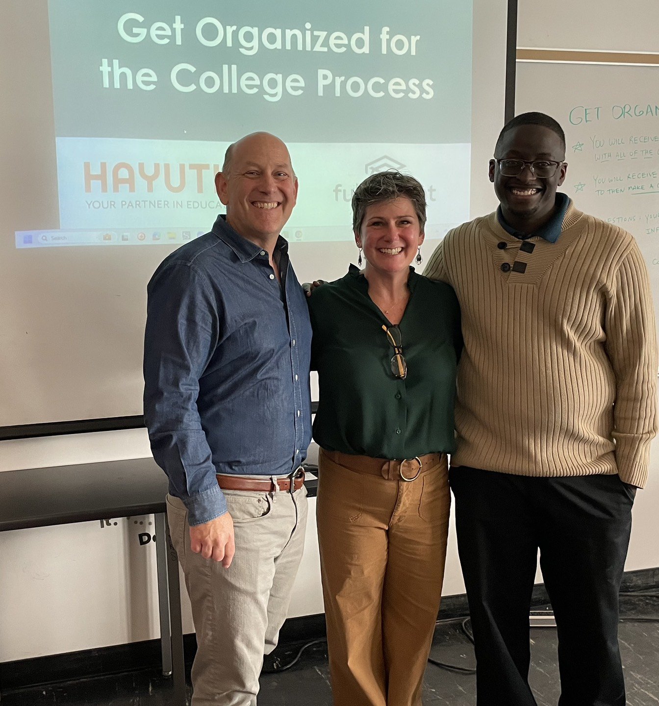 Matthew (Owner), Amy (Owner), and Hunja (Director) presenting to high school juniors about the college process through the Fulfillment Fund.